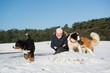 Owner with Berner Sennenhund and Saint Bernhard dog